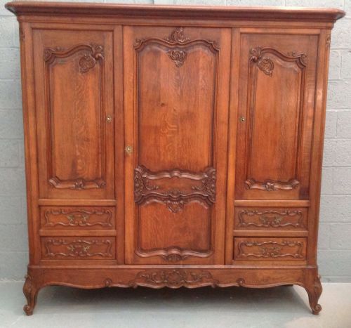 outstanding carved french armoire - CATEGORY: ANTIQUE WARDROBES - DATED 1910