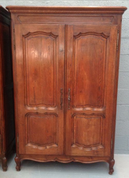 PAIR OF FRENCH OAK ARMOIRES - ADDITIONAL PHOTO 1