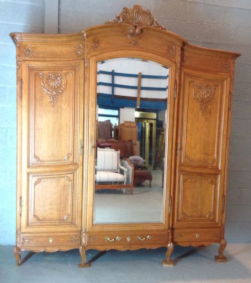 large oak triple breakfront french armoire - CATEGORY: ANTIQUE WARDROBES - DATED 1920