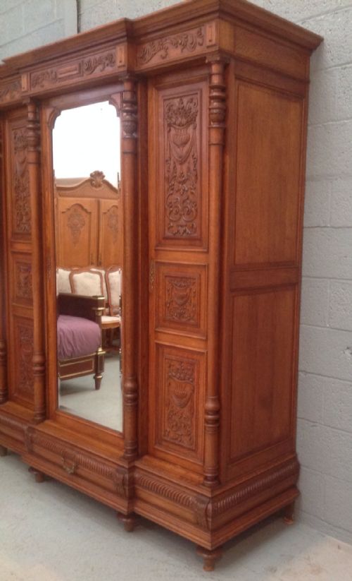CARVED FRENCH OAK BREAKFRONT ARMOIRE - ADDITIONAL PHOTO 8