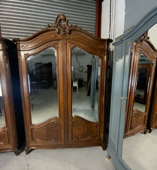 STUNNING PAIR OF FRENCH CARVED OAK ARMOIRES - ADDITIONAL PHOTO 1