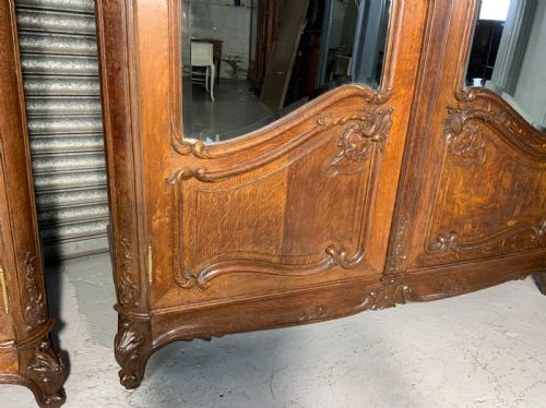 STUNNING PAIR OF FRENCH CARVED OAK ARMOIRES - ADDITIONAL PHOTO 9