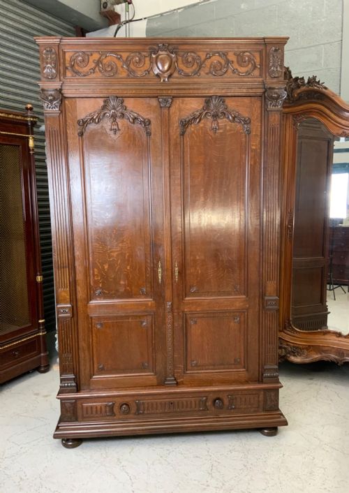 tall carved oak french armoire - CATEGORY: ANTIQUE CUPBOARDS - DATED 1890
