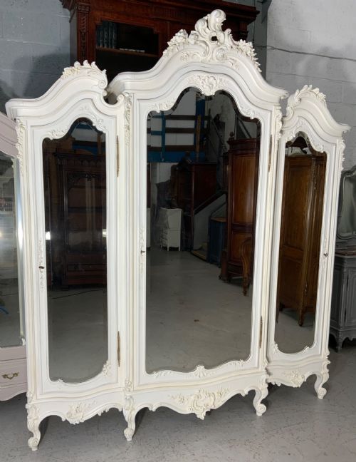 stunning oversized carved triple armoire - CATEGORY: ANTIQUE WARDROBES - DATED 1900