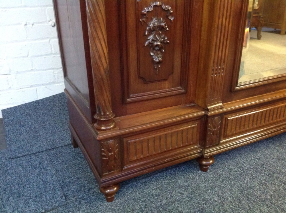 LARGE MAHOGANY BREAKFRONT FRENCH ARMOIRE View V