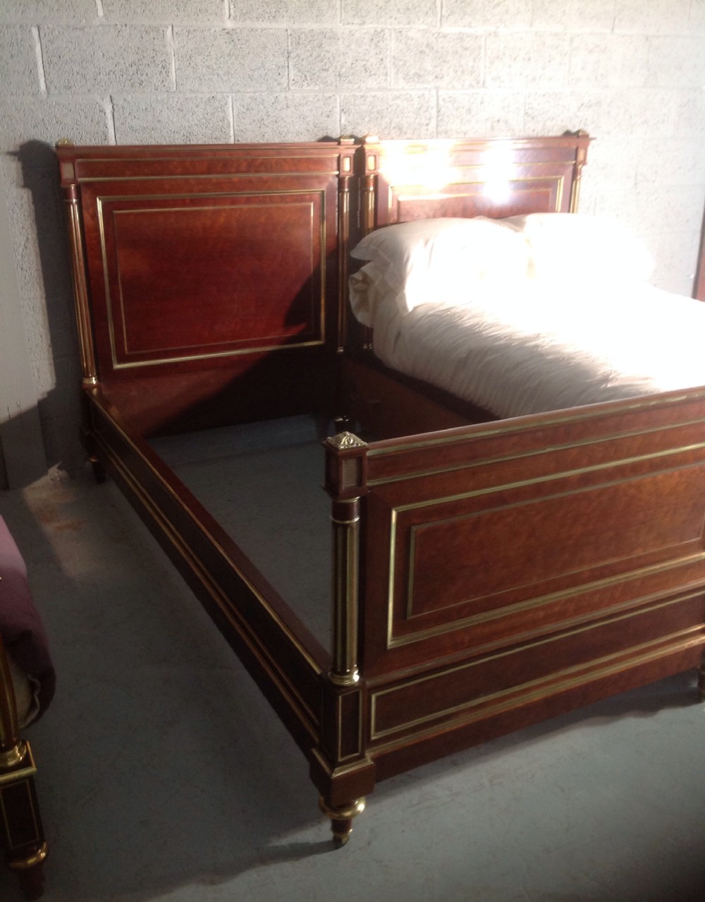 PAIR OF FRENCH EMPIRE MAHOGANY BEDS View III
