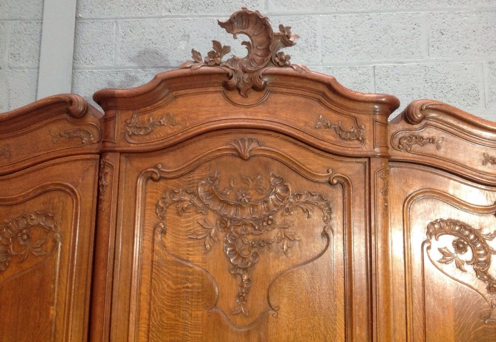 CARVED OAK TRIPLE FRENCH BREAKFRONT ARMOIRE View II