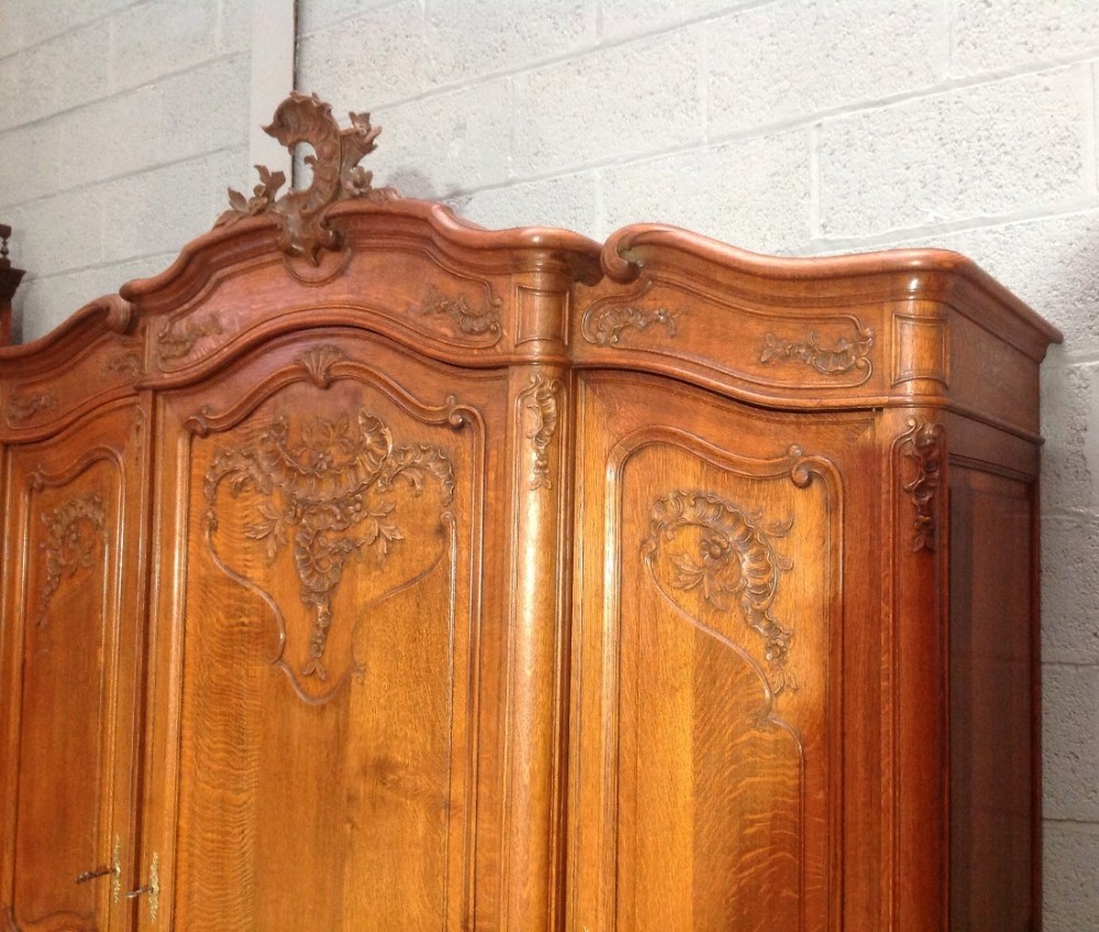 CARVED OAK TRIPLE FRENCH BREAKFRONT ARMOIRE View III