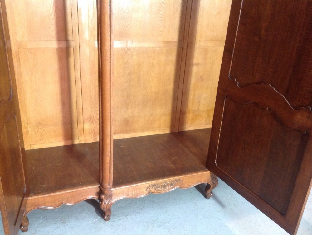 CARVED OAK TRIPLE FRENCH BREAKFRONT ARMOIRE View XI