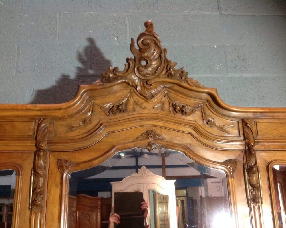 CARVED TRIPLE WALNUT FRENCH ARMOIRE View II
