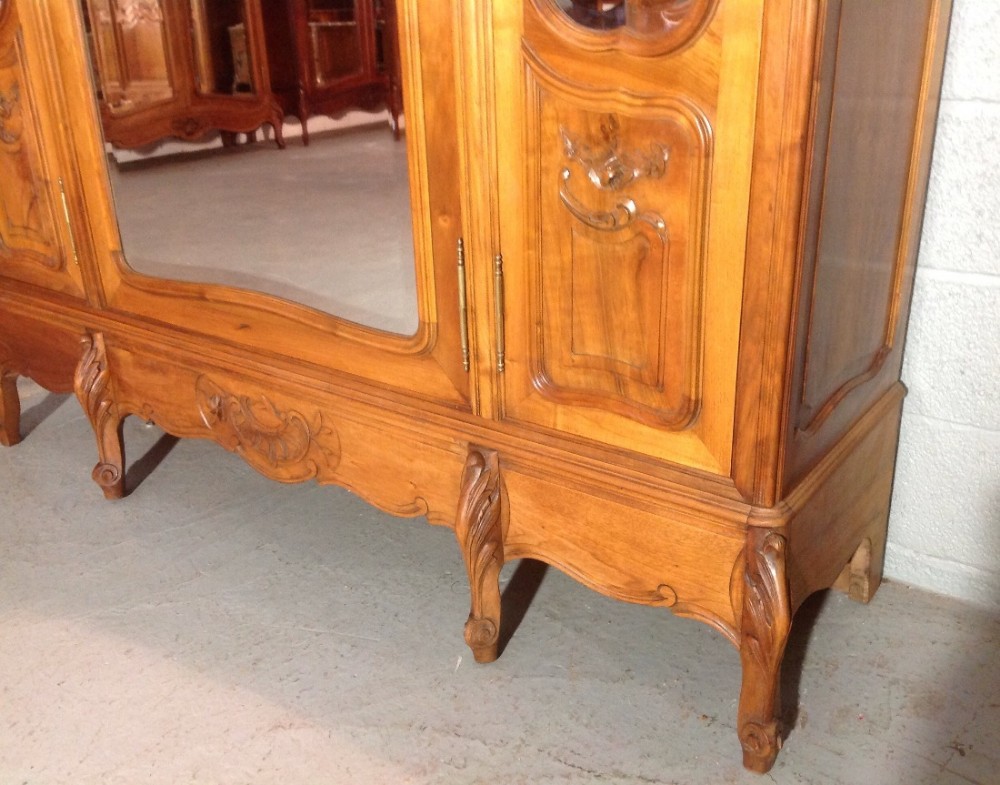 CARVED TRIPLE WALNUT FRENCH ARMOIRE View V