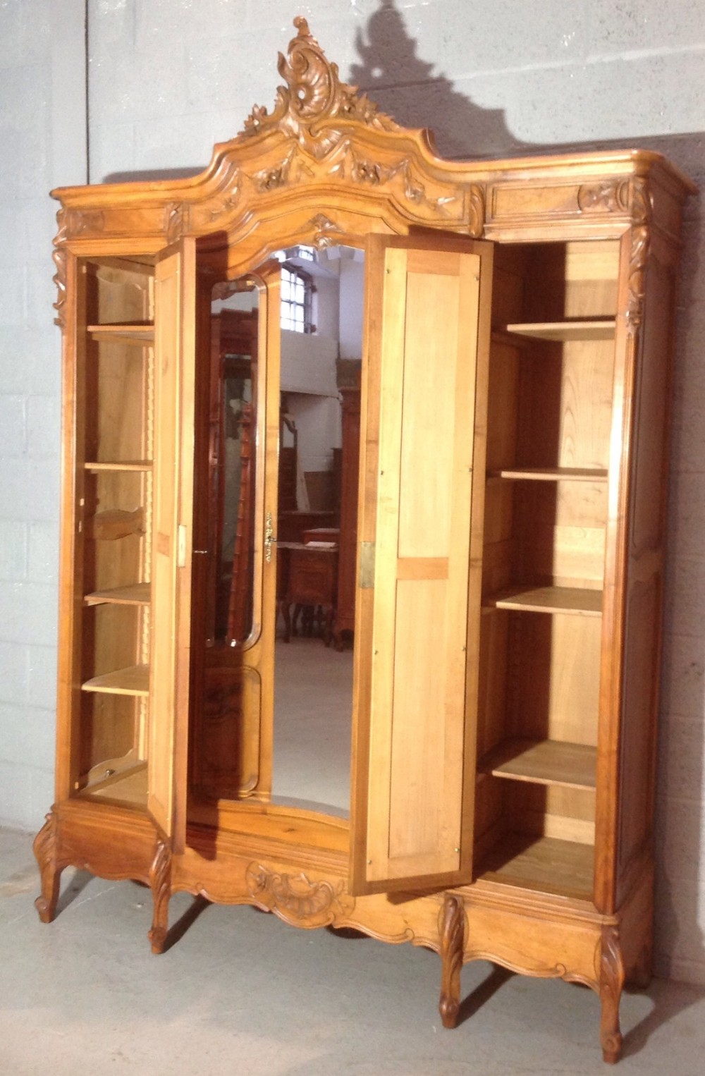 CARVED TRIPLE WALNUT FRENCH ARMOIRE View XII