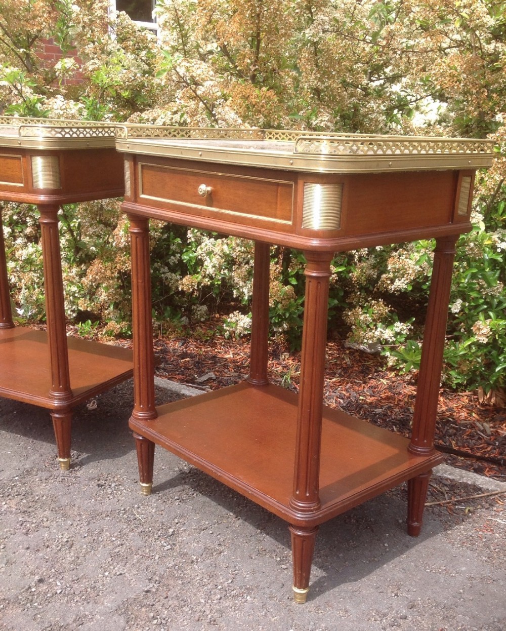 PAIR OF FRENCH MAHOGANY AND BRASS BEDSIDE CABINETS View V
