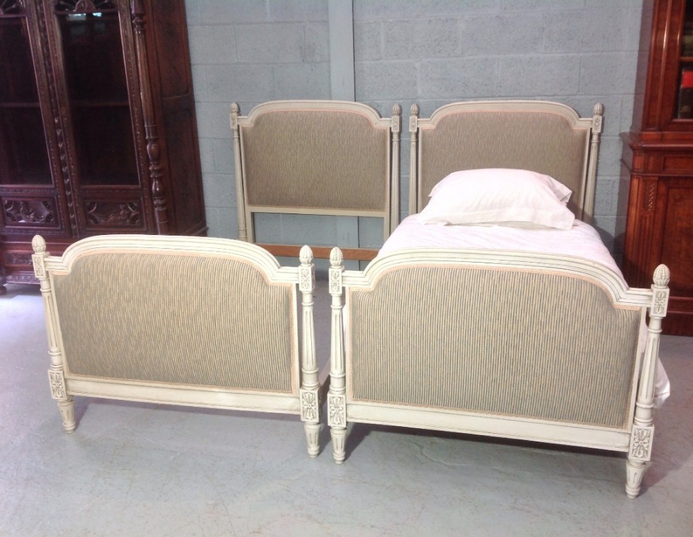 PAIR OF FRENCH UPHOLSTERED SINGLE BEDS View II