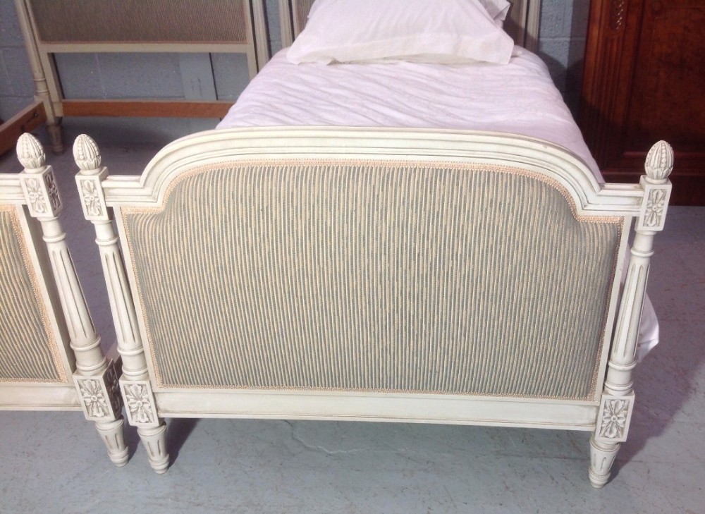 PAIR OF FRENCH UPHOLSTERED SINGLE BEDS View III