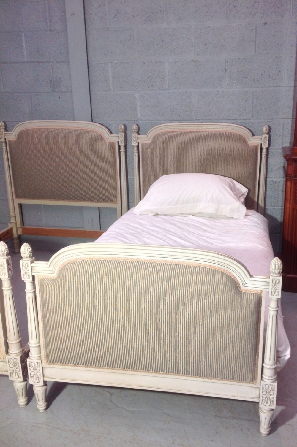 PAIR OF FRENCH UPHOLSTERED SINGLE BEDS View IV