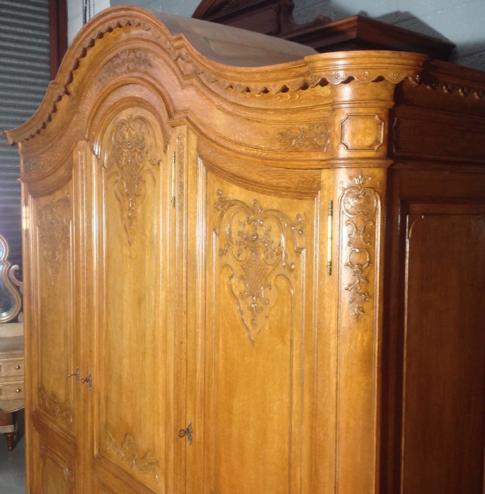 ORNATELY CARVED FRENCH OAK ARMOIRE View III
