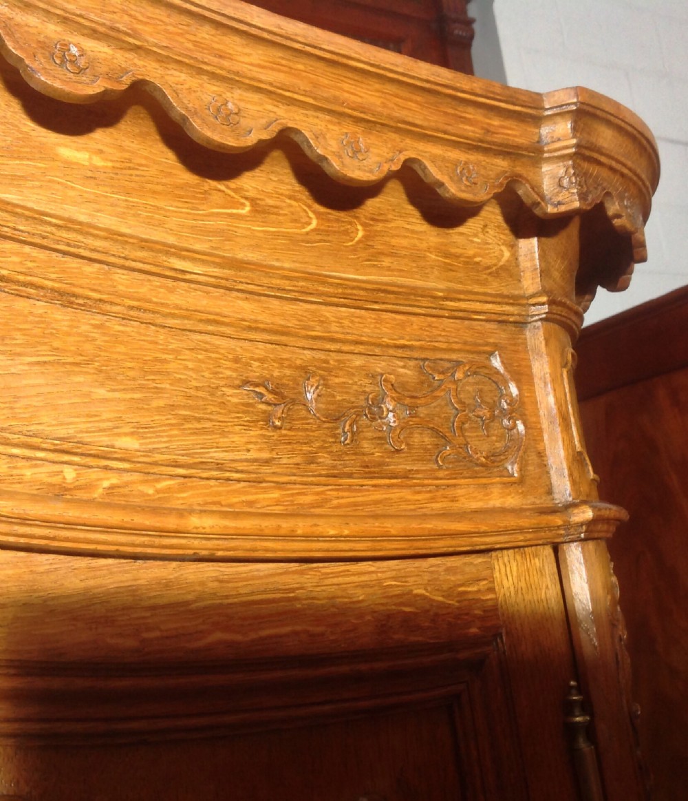 ORNATELY CARVED FRENCH OAK ARMOIRE View VIII