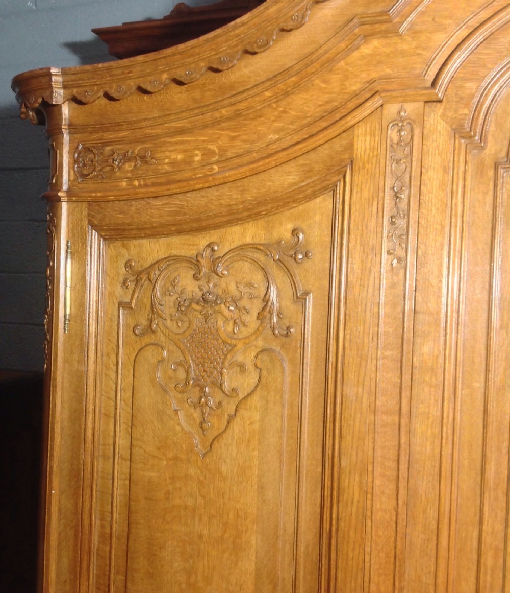 ORNATELY CARVED FRENCH OAK ARMOIRE View XIII