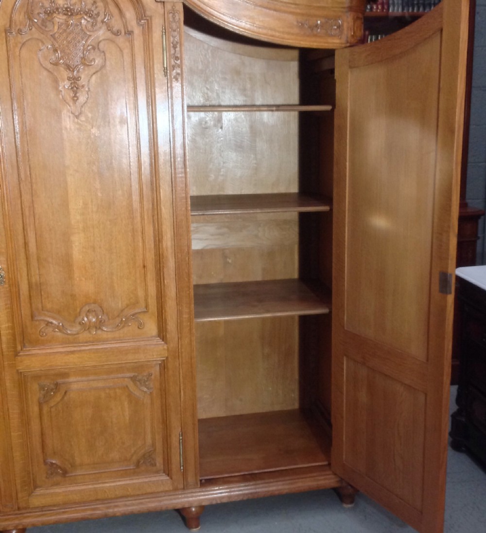 ORNATELY CARVED FRENCH OAK ARMOIRE View XVI