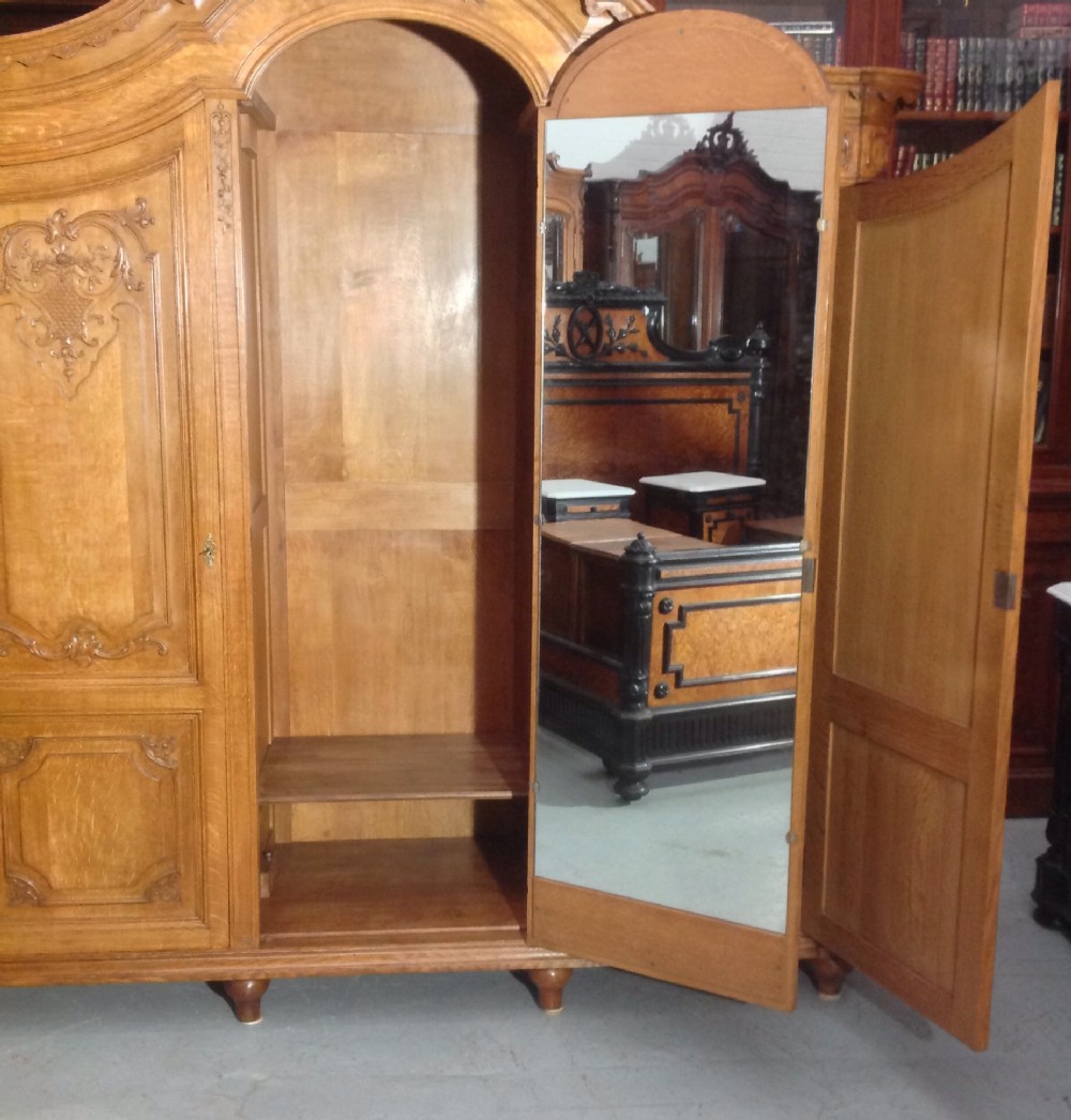 ORNATELY CARVED FRENCH OAK ARMOIRE View XVII