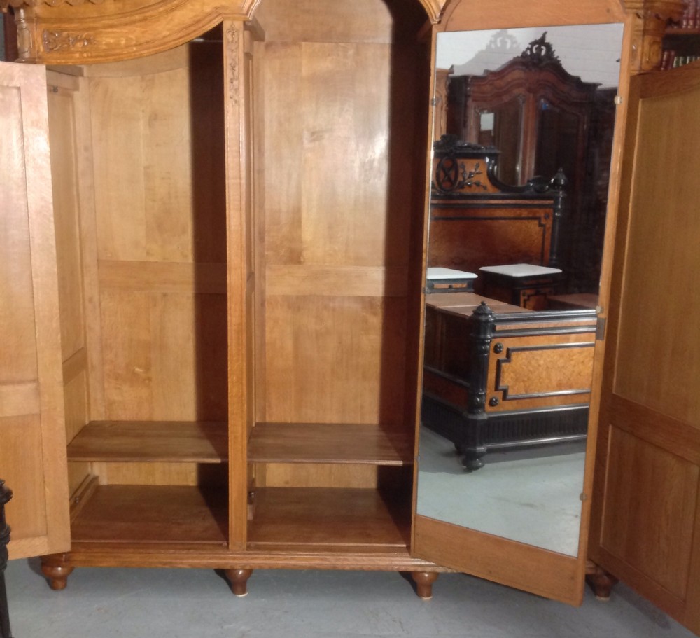 ORNATELY CARVED FRENCH OAK ARMOIRE View XVIII