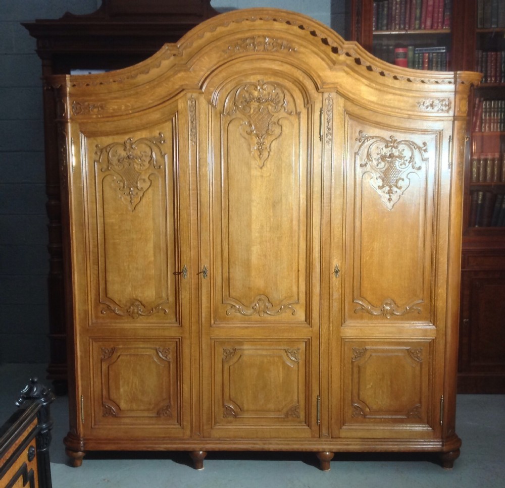 ORNATELY CARVED FRENCH OAK ARMOIRE View XX
