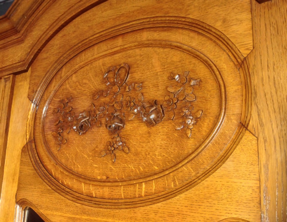 CARVED OAK PAIR OF FRENCH ARMOIRES View III