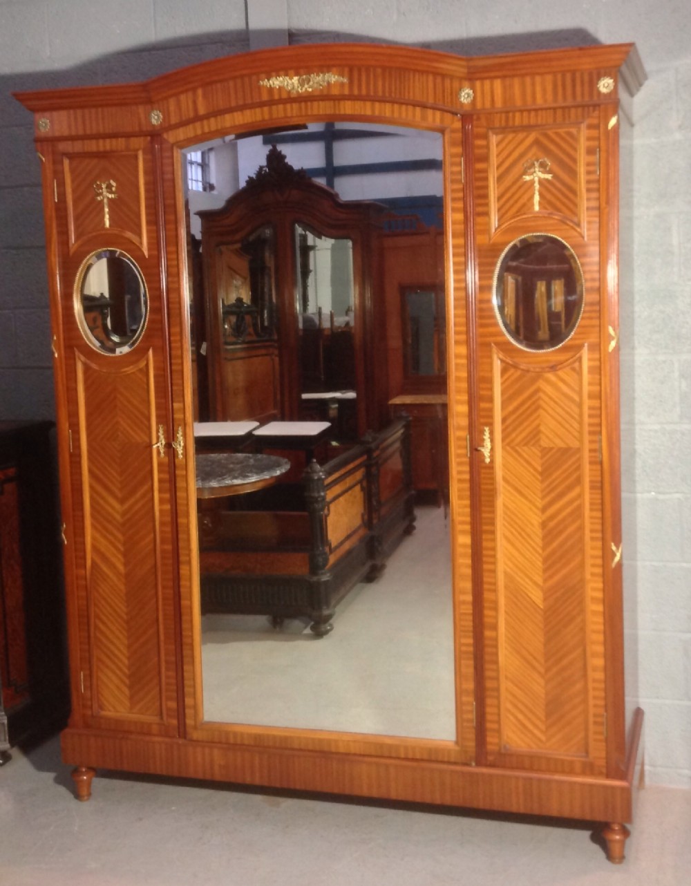 MAHOGANY AND BRASS FRENCH TRIPLE ARMOIRE. View II