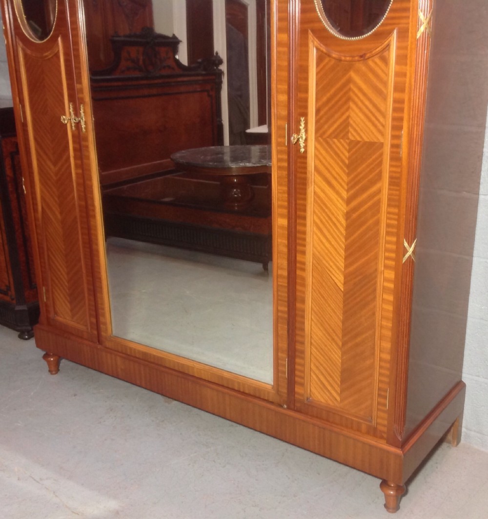 MAHOGANY AND BRASS FRENCH TRIPLE ARMOIRE. View XII