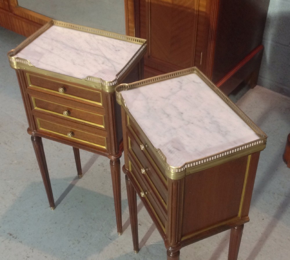 PAIR OF FRENCH MAHOGANY AND BRASS BEDSIDE CABINETS. View II