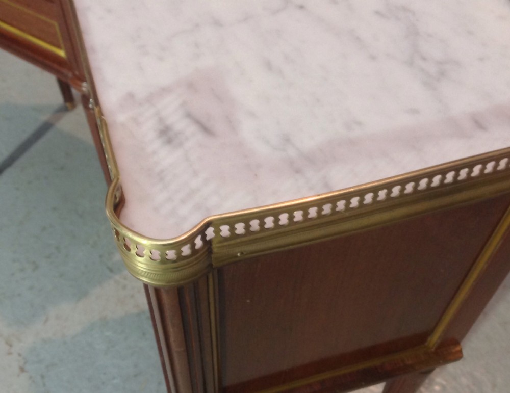 PAIR OF FRENCH MAHOGANY AND BRASS BEDSIDE CABINETS. View III