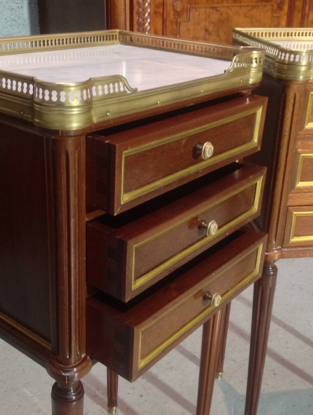 PAIR OF FRENCH MAHOGANY AND BRASS BEDSIDE CABINETS. View IV