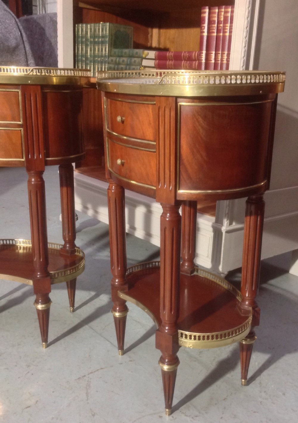 PAIR OF FRENCH MAHOGANY AND BRASS BEDSIDE CABINETS View II