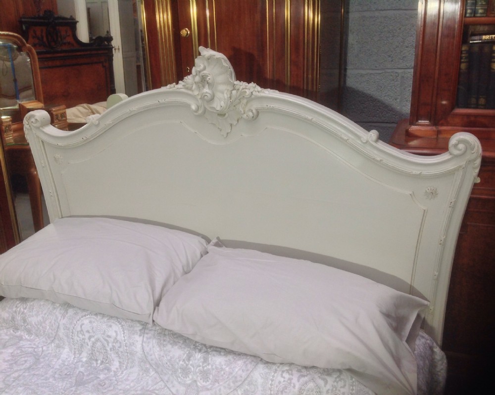ORNATELY CARVED WALNUT BED IN FARROW AND BALL GREY View III