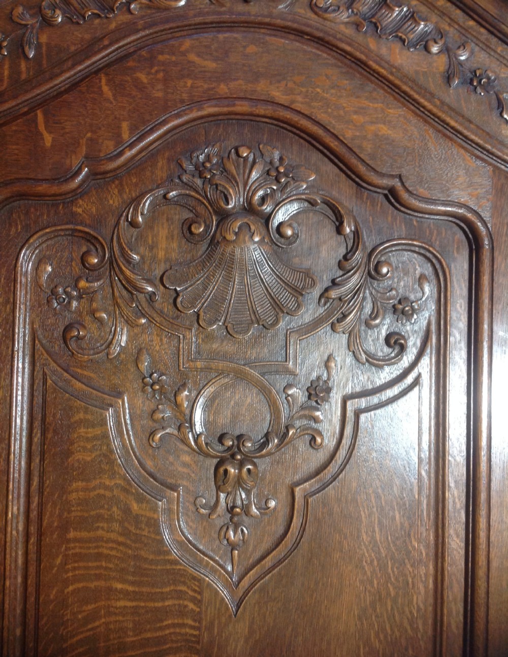 STUNNING PAIR OF FRENCH CARVED OAK ARMOIRES View III
