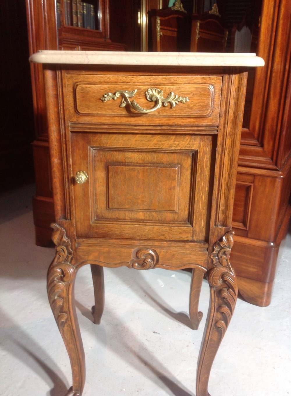 PAIR OF CARVED OAK FRENCH BEDSIDE CABINETS View II