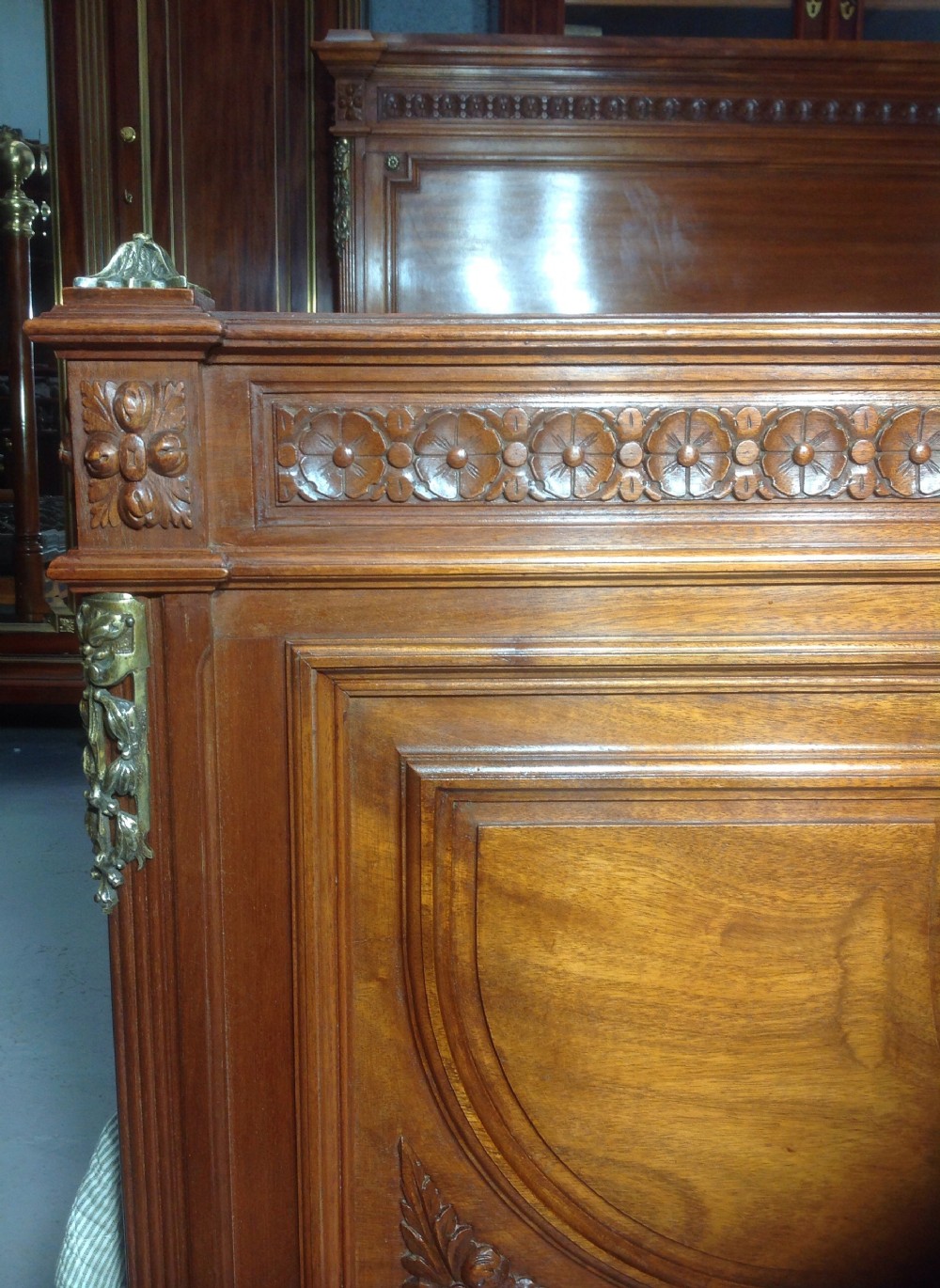 CARVED WALNUT FRENCH BED WITH BRASS DETAILING. View III
