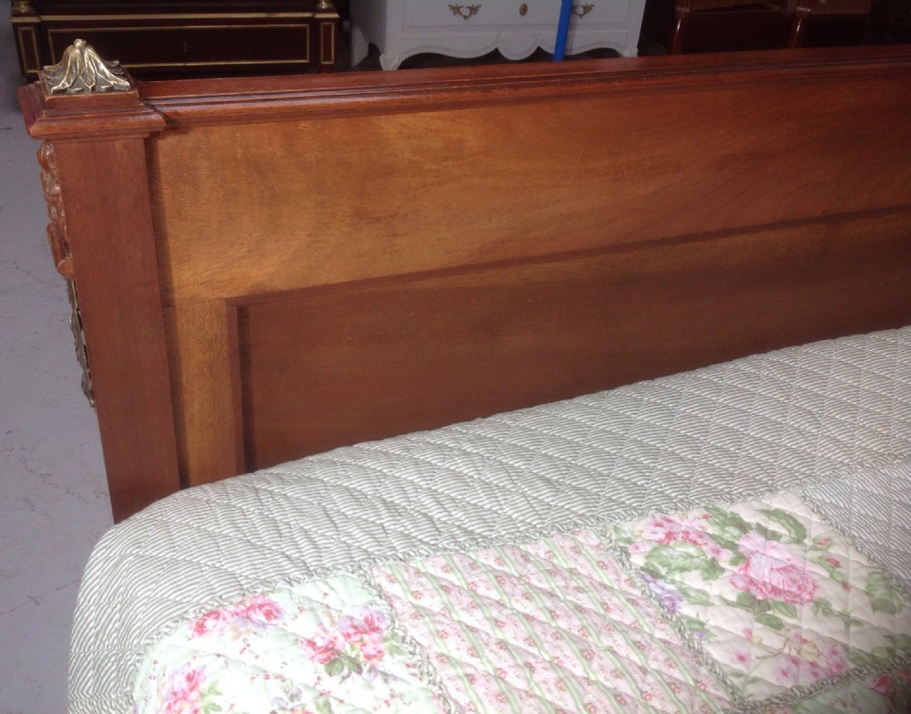 CARVED WALNUT FRENCH BED WITH BRASS DETAILING. View IX