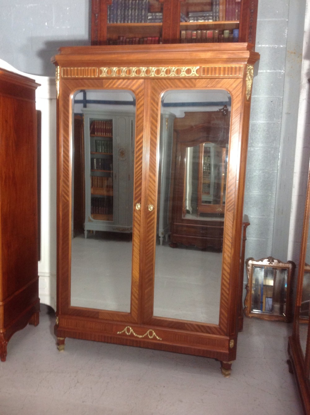 FRENCH MAHOGANY EMPIRE ARMOIRE.