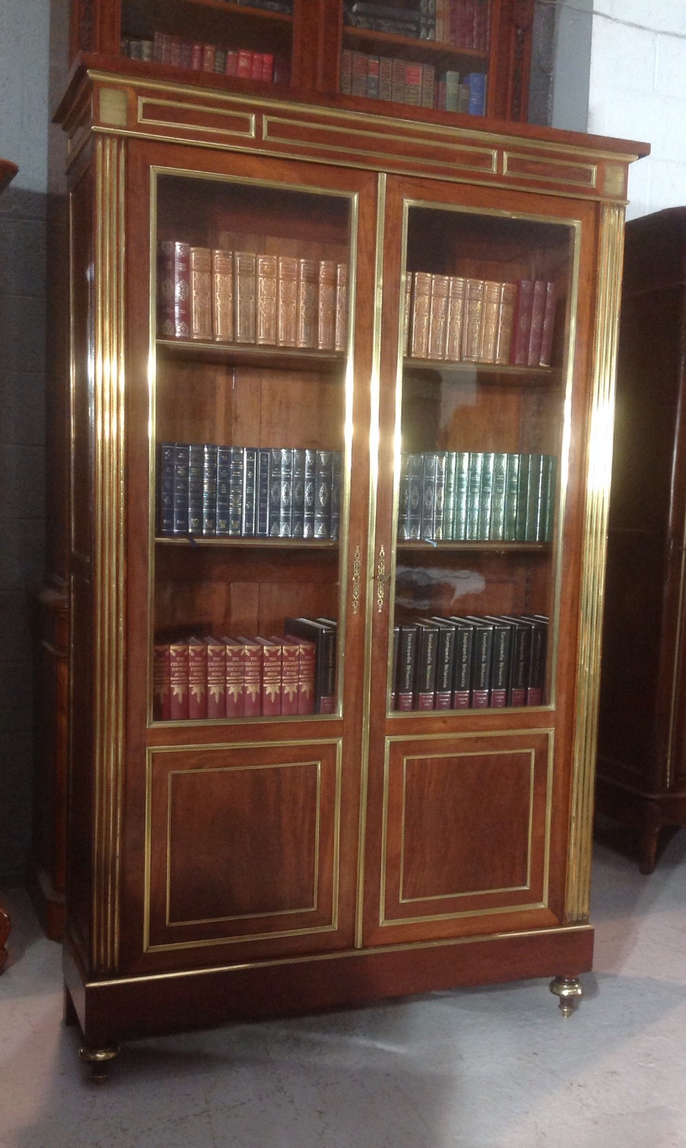 INLAID BRASS AND MAHOGANY FRENCH BOOKCASE View II