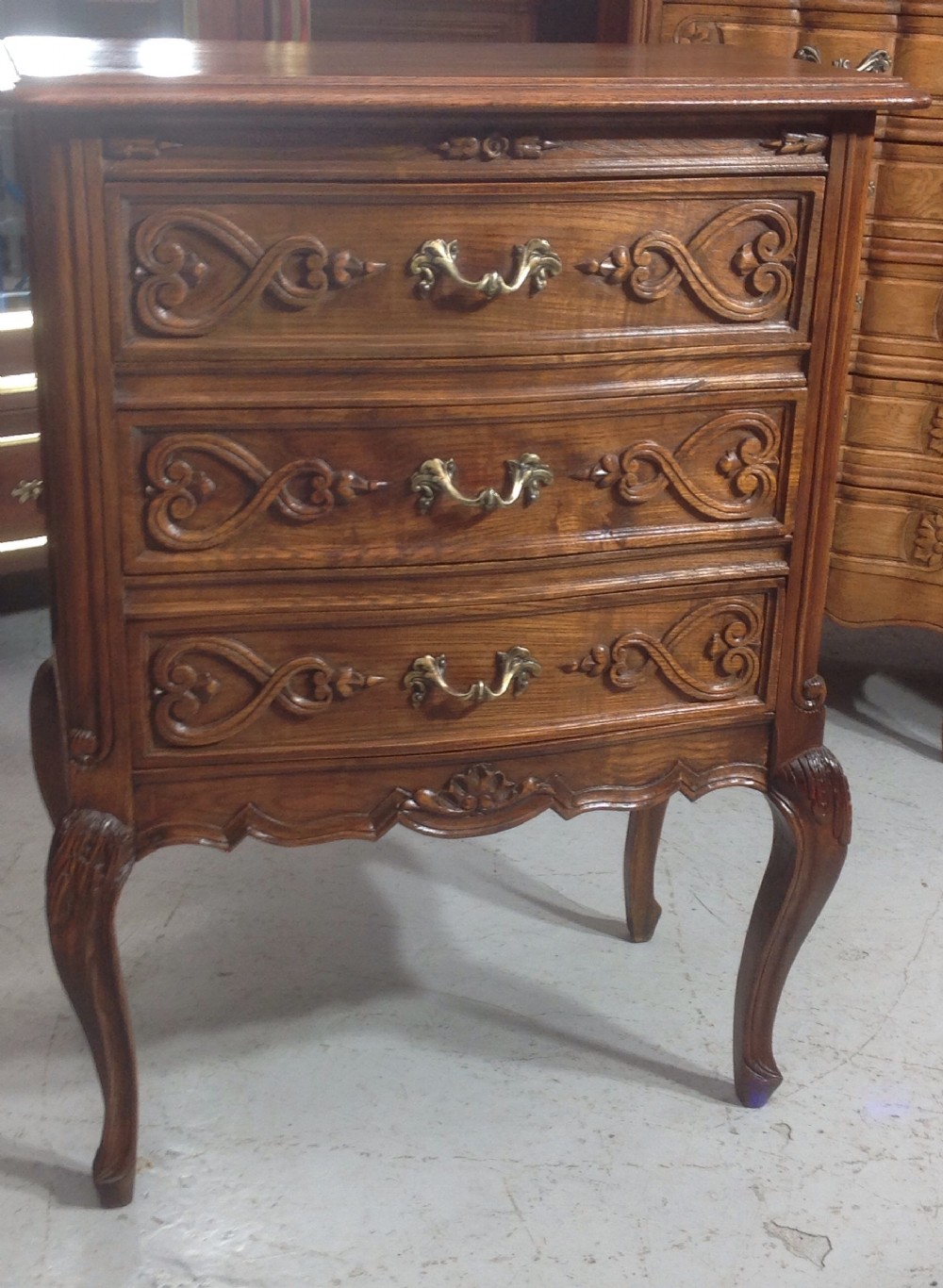 CARVED OAK BOW FRONT CHEST View II