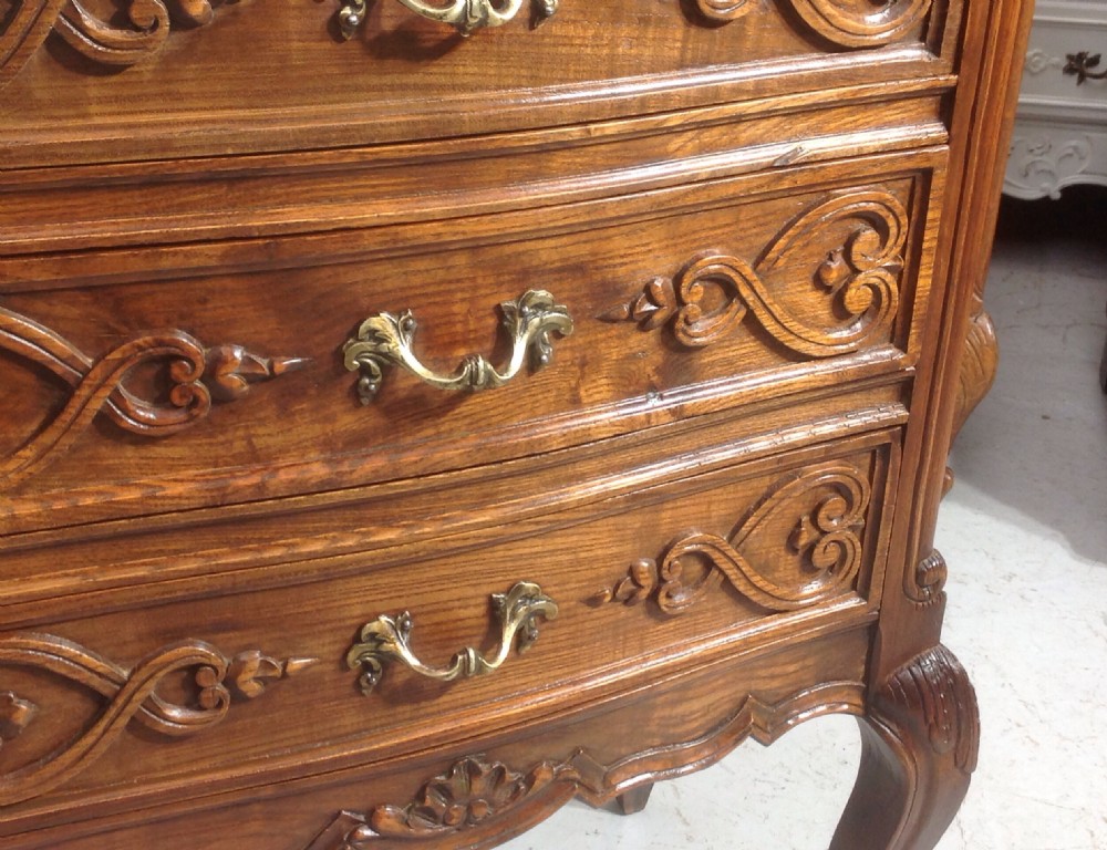 CARVED OAK BOW FRONT CHEST View III