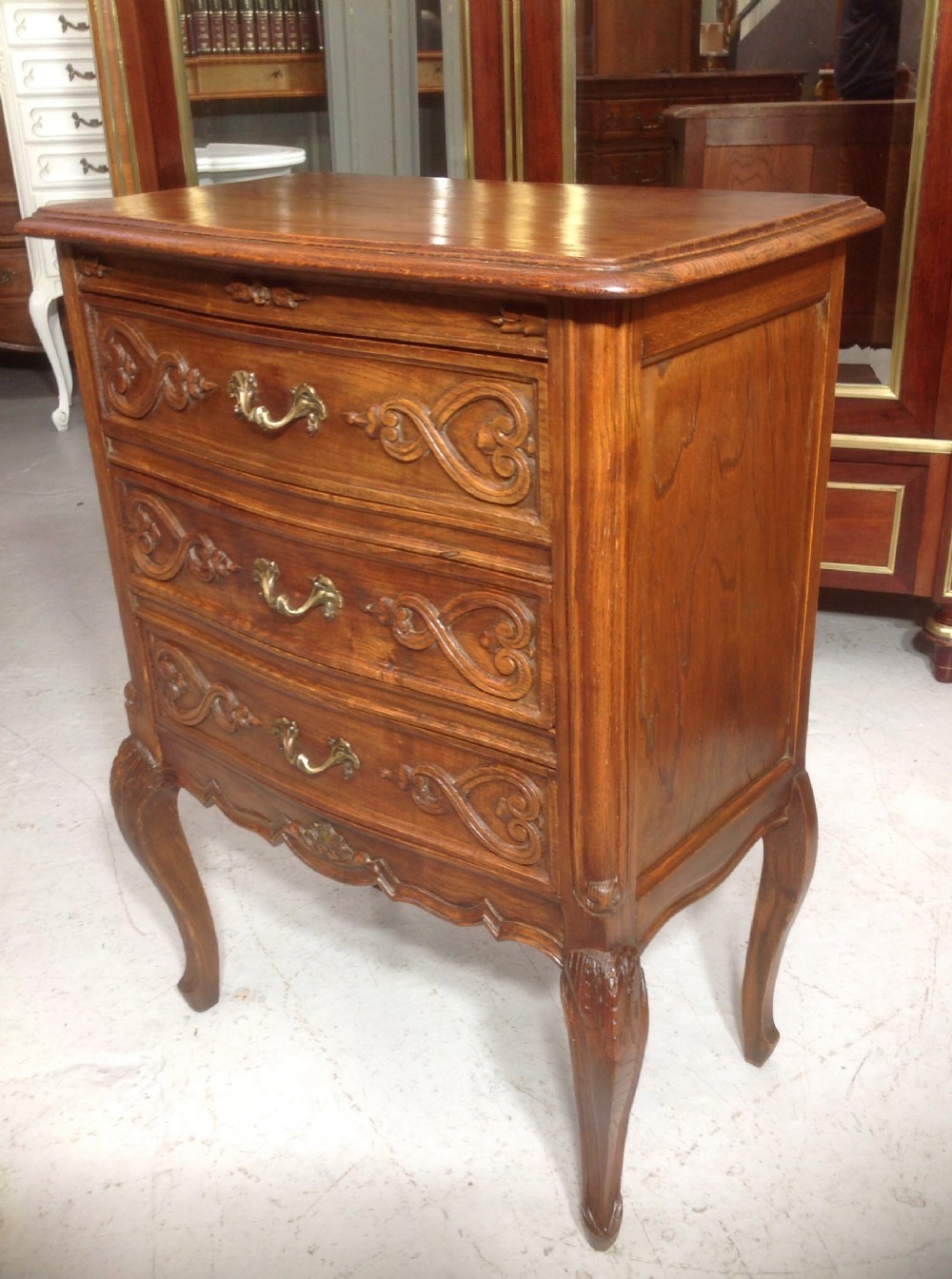CARVED OAK BOW FRONT CHEST View IV