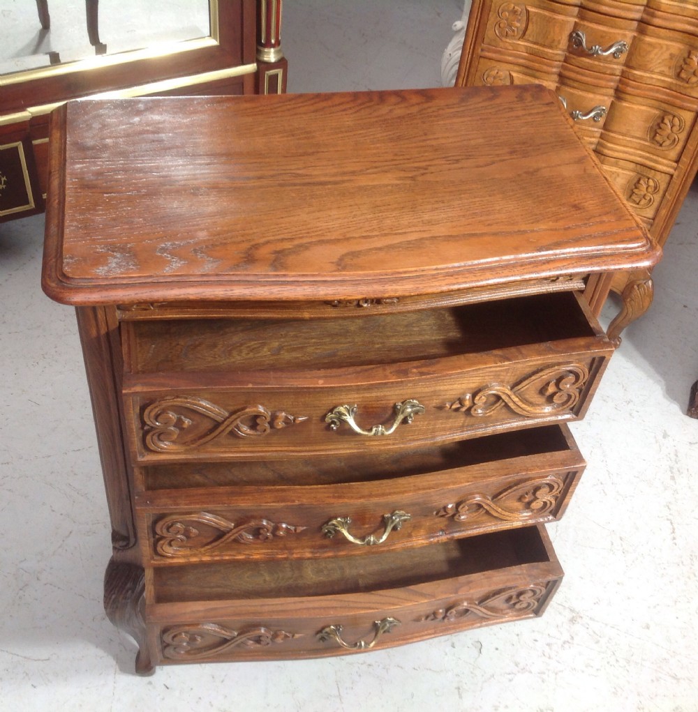 CARVED OAK BOW FRONT CHEST View V