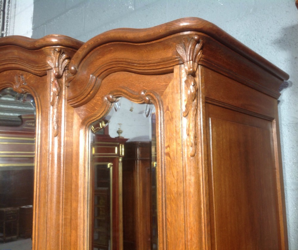 LARGE CARVED OAK FRENCH ARMOIRE View II