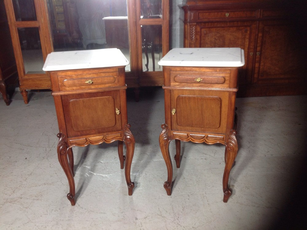 PAIR OF FRENCH MAHOGANY BEDSIDE CABINETS
