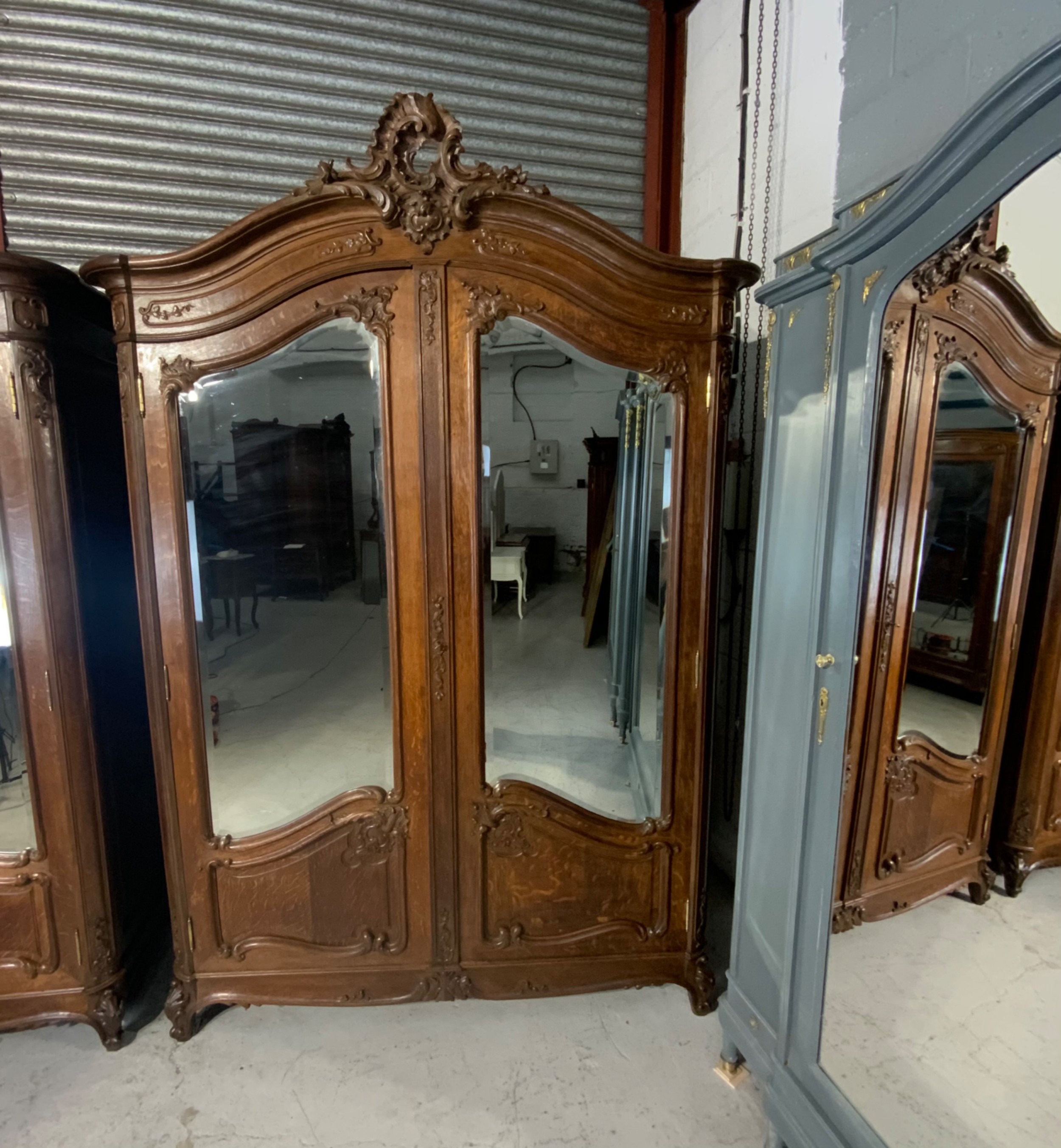 STUNNING PAIR OF FRENCH CARVED OAK ARMOIRES View II