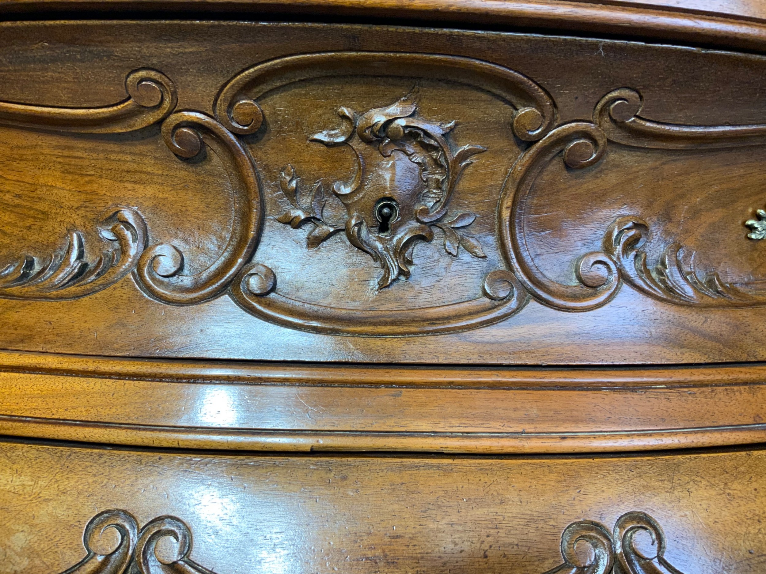 STUNNING CARVED FRENCH WALNUT BOMBE STYLE COMMODE  View IV
