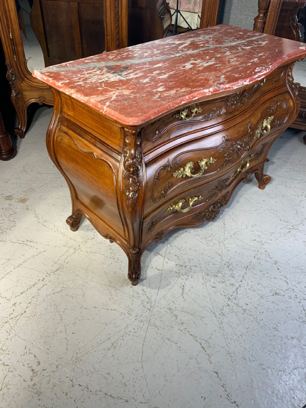 STUNNING CARVED FRENCH WALNUT BOMBE STYLE COMMODE  View IX